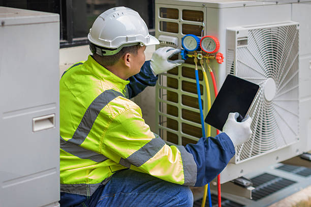 Professional Heat Pump Repair technician working in Forestdale, AL